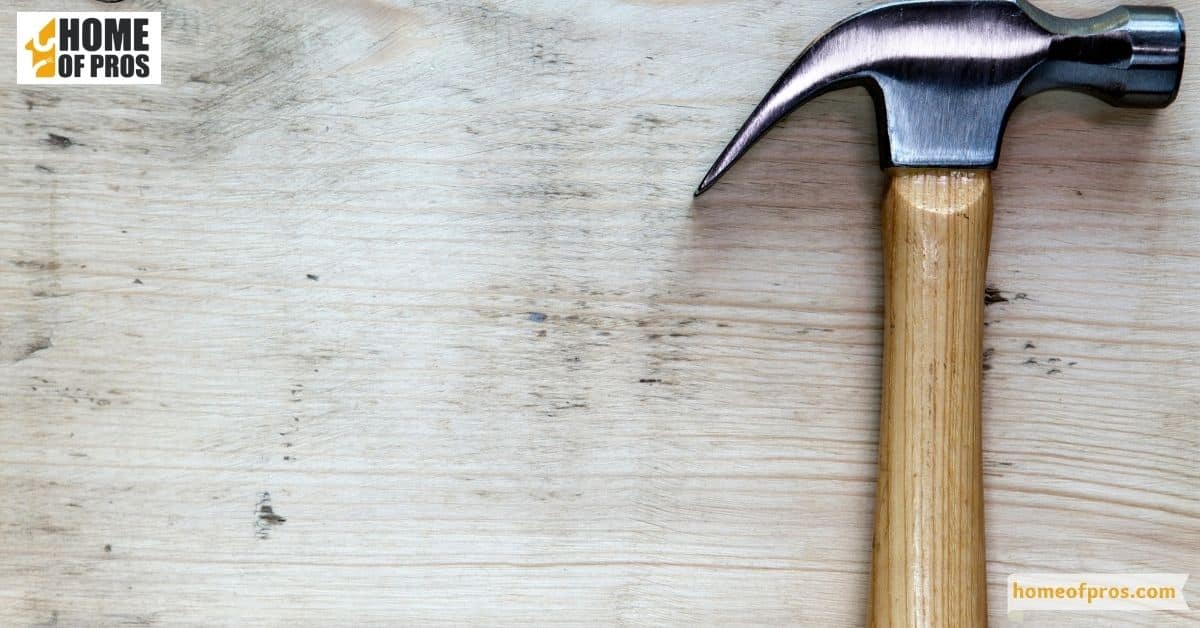 Cleaning the head and handle of a hammer